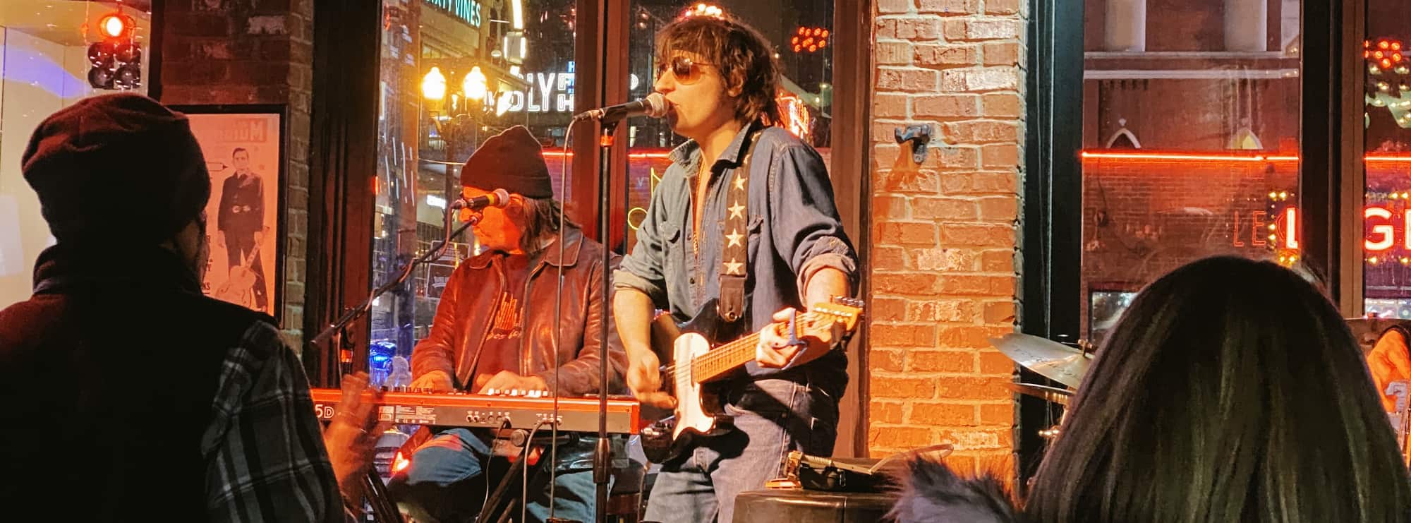 bar singer on guitar in Charlotte