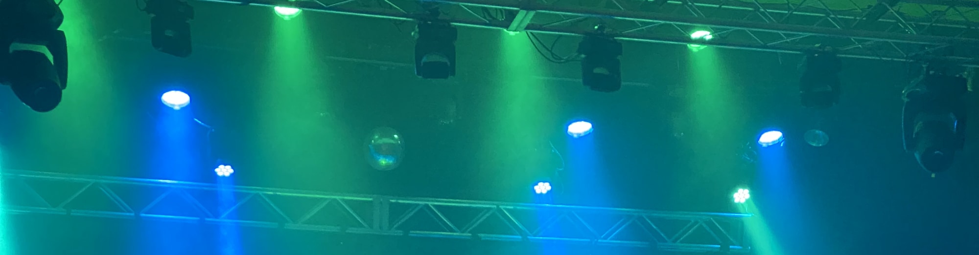 blue and green theater stage lights Charlotte